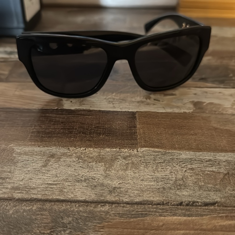 WNS Versace sunglasses worn once very good condition. black w/gold accessories.